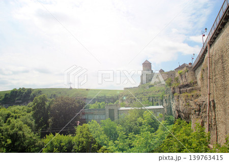 Medieval castle in Kamyanets-Podilskyi with views of high stony walls 139763415