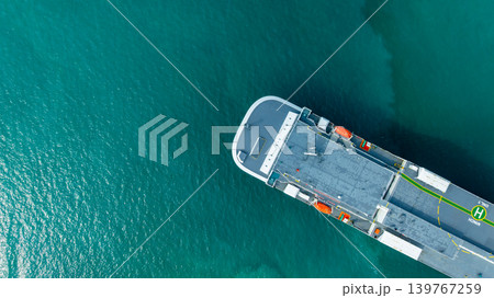 Aerial top view vehicles carrier on sea, Ro Ro (Roll on Roll off) automobile carrier vessel international car terminal, Automobile industry distribution logistic transport new car. 139767259