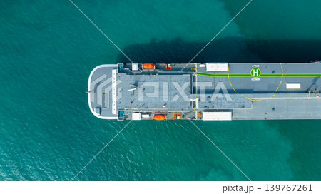 Aerial top view vehicles carrier on sea, Ro Ro (Roll on Roll off) automobile carrier vessel international car terminal, Automobile industry distribution logistic transport new car. 139767261