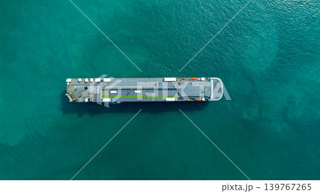 Aerial top view vehicles carrier on sea, Ro Ro (Roll on Roll off) automobile carrier vessel international car terminal, Automobile industry distribution logistic transport new car. 139767265