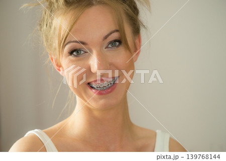 Happy positive smiling blonde woman Happy positive smiling blonde woman 139768144