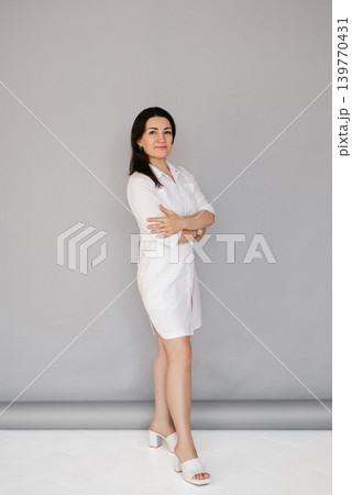 Aesthetic Medicine Specialist in White Medical Dress 139770431