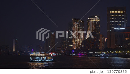 Stunning Night View of Shanghai's Waterfront with Captivating Illuminated Skyline Stunning Night View of Shanghai's Waterfront with Captivating Illuminated Skyline 139770886
