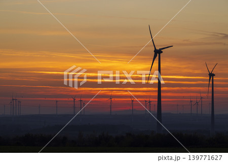 Wind turbine in flat landscape near Vienna, Austria Wind turbine in flat landscape near Vienna, Austria 139771627