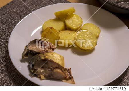 This dish serving of smocked mackerel and roasted potatoes This dish serving of smocked mackerel and roasted potatoes 139771819