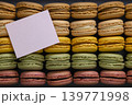 macaroons of different colors on a black background 139771998