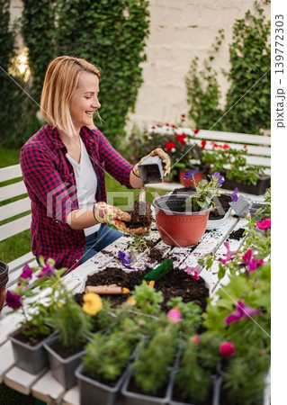 Enjoying a sunny afternoon in the backyard garden 139772303