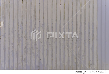 Subtle textured background. Calm weathered wall featuring soft stains and understated texture appeal Subtle textured background. Calm weathered wall featuring soft stains and understated texture appeal 139773629