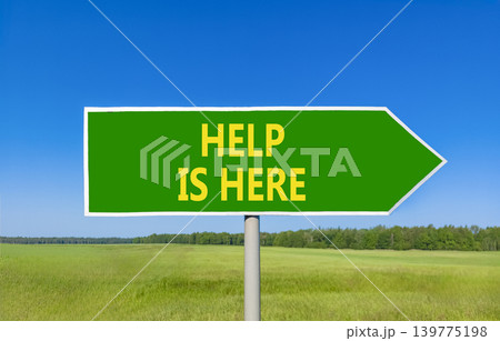 Help is here and support words symbol. Concept words Help is here on beautiful green road sign. Beautiful blue sky green field background. Business help is here and support concept. Copy space. Help is here and support words symbol. Concept words Help is here on beautiful green road sign. Beautiful blue sky green field background. Business help is here and support concept. Copy space. 139775198