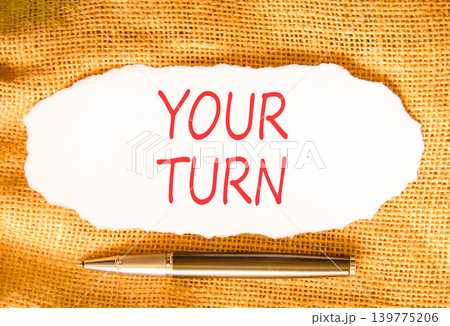 Your turn words symbol. Concept words Your turn on beautiful white paper. Beautiful canvas background. Business your turn motivational support concept. Copy space. 139775206