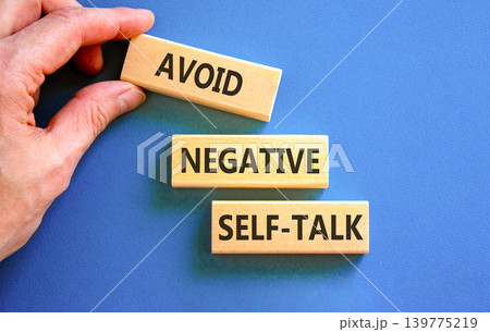 Avoid negative self-talk symbol. Concept words Avoid negative self-talk on beautiful wooden blocks. Beautiful blue background. Business psychology avoid negative self-talk concept. Copy space. Avoid negative self-talk symbol. Concept words Avoid negative self-talk on beautiful wooden blocks. Beautiful blue background. Business psychology avoid negative self-talk concept. Copy space. 139775219