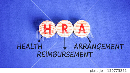HRA health reimbursement arrangement symbol. Concept words HRA health reimbursement arrangement on beautiful wooden circles. Beautiful blue background. Medical HRA concept. Copy space. HRA health reimbursement arrangement symbol. Concept words HRA health reimbursement arrangement on beautiful wooden circles. Beautiful blue background. Medical HRA concept. Copy space. 139775251