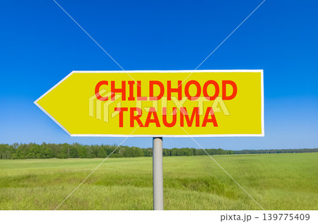 Childhood trauma words symbol. Concept words Childhood trauma on beautiful yellow road sign. Beautiful blue sky green field background. Psychological childhood trauma support concept. Copy space. Childhood trauma words symbol. Concept words Childhood trauma on beautiful yellow road sign. Beautiful blue sky green field background. Psychological childhood trauma support concept. Copy space. 139775409
