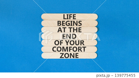 Leave your comfort zone symbol. Concept words Life begins at the end of your comfort zone on beautiful wooden stick. Beautiful blue background. Psychological Leave comfort zone concept. Copy space. Leave your comfort zone symbol. Concept words Life begins at the end of your comfort zone on beautiful wooden stick. Beautiful blue background. Psychological Leave comfort zone concept. Copy space. 139775455