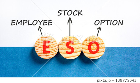 ESO employee stock option symbol. Concept words ESO employee stock option on beautiful wooden circles. Beautiful white blue background. Business ESO employee stock option concept. Copy space. ESO employee stock option symbol. Concept words ESO employee stock option on beautiful wooden circles. Beautiful white blue background. Business ESO employee stock option concept. Copy space. 139775643