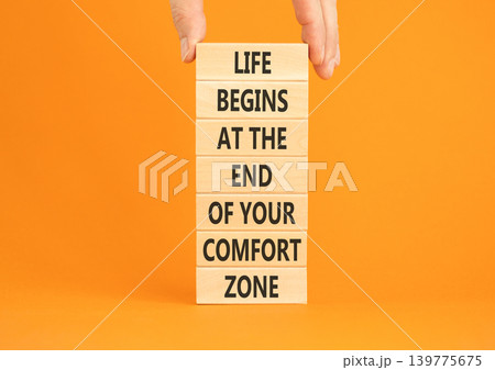 Leave your comfort zone symbol. Concept words Life begins at the end of your comfort zone on beautiful wooden blocks. Beautiful orange background. Psychological Leave comfort zone concept. Copy space. Leave your comfort zone symbol. Concept words Life begins at the end of your comfort zone on beautiful wooden blocks. Beautiful orange background. Psychological Leave comfort zone concept. Copy space. 139775675
