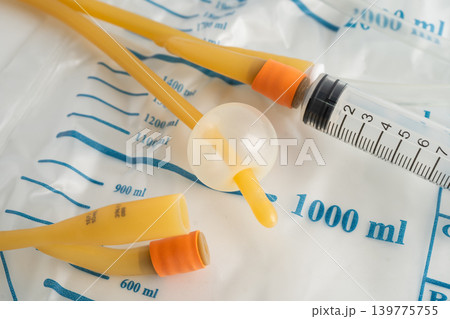 Foley catheter and urine drainage bag collect urine for disability or patient in hospital. 139775755