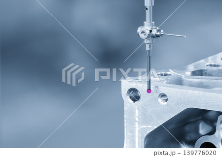 High-precision quality control of aluminum parts using a modular touch probe on a CMM (Coordinate Measuring Machine) in a blue-toned scene. High-precision quality control of aluminum parts using a modular touch probe on a CMM (Coordinate Measuring Machine) in a blue-toned scene. 139776020