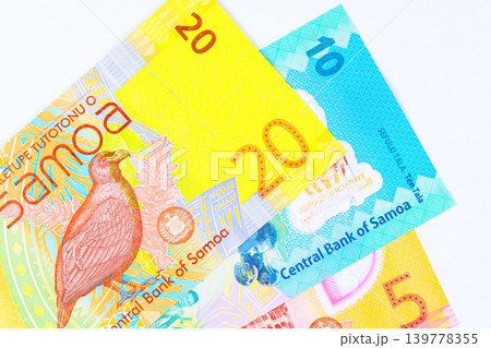 Various Samoan cash tala currency banknotes are stacked together issued by Central Bank of Samoa Various Samoan cash tala currency banknotes are stacked together issued by Central Bank of Samoa 139778355