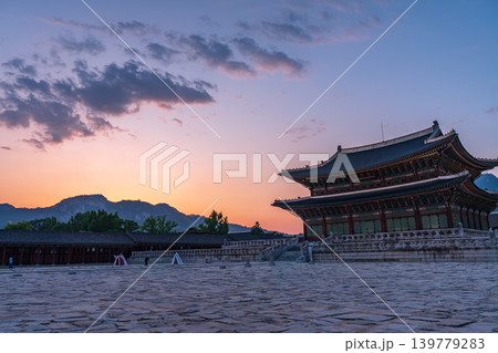 Seoul, South Korea - May. 17, 2026 : Majestic Geunjeongjeon Hall in Gyeongbokgung Palace glowing in intense sunset light, Seoul, South Korea Seoul, South Korea - May. 17, 2026 : Majestic Geunjeongjeon Hall in Gyeongbokgung Palace glowing in intense sunset light, Seoul, South Korea 139779283