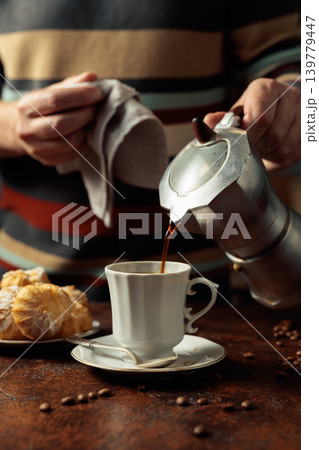 Profiteroles with mascarpone and cup of black coffee. Profiteroles with mascarpone and cup of black coffee. 139779447