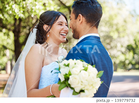 Happy couple, wedding and love at park with celebration, laugh and trust with bouquet in spring. People, marriage and smile with commitment, flowers or care with funny partner for loyalty at garden Happy couple, wedding and love at park with celebration, laugh and trust with bouquet in spring. People, marriage and smile with commitment, flowers or care with funny partner for loyalty at garden 139779732