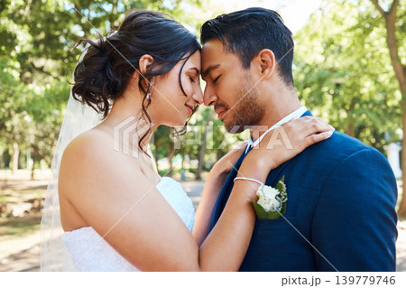 Wedding, forehead touch or couple in nature with smile, trust or romantic moment in union ceremony. People, bride or groom with commitment, partnership or emotional connection in marriage celebration Wedding, forehead touch or couple in nature with smile, trust or romantic moment in union ceremony. People, bride or groom with commitment, partnership or emotional connection in marriage celebration 139779746