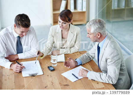 Business people, boardroom and signature on paperwork in meeting or lawyer agreement, partnership or negotiation. Men, woman and document in corporate office for collaboration, consultant or contract Business people, boardroom and signature on paperwork in meeting or lawyer agreement, partnership or negotiation. Men, woman and document in corporate office for collaboration, consultant or contract 139779889