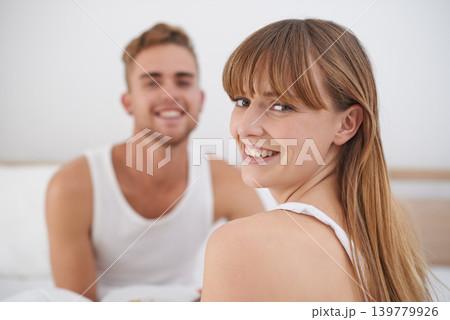 Woman, couple and portrait in bed on weekend, happy and bonding for love in relationship at home. People, loyalty and commitment to marriage in bedroom, smiling and romance or comfortable and lazy Woman, couple and portrait in bed on weekend, happy and bonding for love in relationship at home. People, loyalty and commitment to marriage in bedroom, smiling and romance or comfortable and lazy 139779926