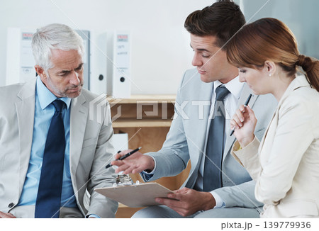 Business people, talking or lawyer with contract for paperwork, strategy or notes at office. Financial advisor, teamwork or employees with documents, deal or legal advice in meeting for consultation Business people, talking or lawyer with contract for paperwork, strategy or notes at office. Financial advisor, teamwork or employees with documents, deal or legal advice in meeting for consultation 139779936