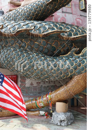 Dragon Statue with American Flag and Decorative Elements 139779980