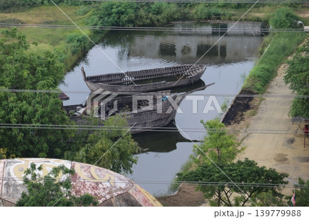 Old Boats in a Canal with Greenery Old Boats in a Canal with Greenery 139779988