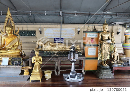 Golden Buddha Statues in Thai Temple Shrine Golden Buddha Statues in Thai Temple Shrine 139780021