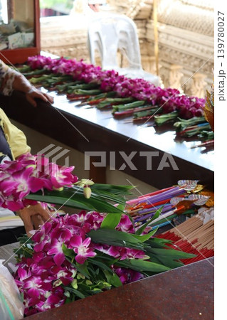 Floral Market Scene with Orchids and Hands 139780027