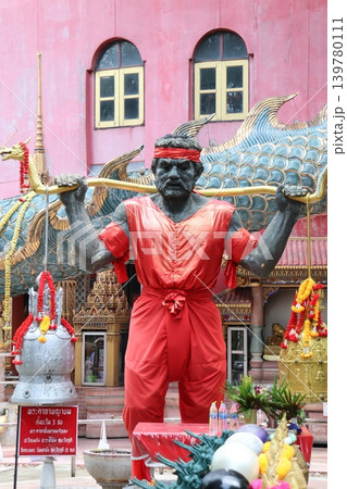 Thai Deity Statue with Bow and Red Attire 139780111