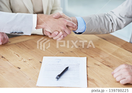 Handshake, business people and contract, onboarding with human resources, meeting or interview at office. Paperwork, cooperation and partnership with signature, hiring and shaking hands for welcome 139780225