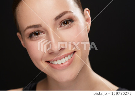 Woman, closeup and portrait in studio with cosmetics, happiness and beauty results of cosmetology in mockup. Model, face and skincare with retinol for glow, collagen and make up on black background 139780273