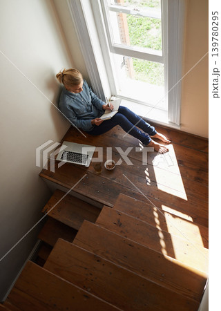 Woman, freelancer and window or notes in book, remote work and laptop on floor for research. Female person, top view and writing ideas or planning in journal, inspiration and brainstorming at home Woman, freelancer and window or notes in book, remote work and laptop on floor for research. Female person, top view and writing ideas or planning in journal, inspiration and brainstorming at home 139780295