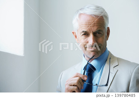 CEO, glasses and portrait of senior businessman, professional and consultant at office. Face, entrepreneur and mature manager, executive and confident boss in suit for career at company in Australia CEO, glasses and portrait of senior businessman, professional and consultant at office. Face, entrepreneur and mature manager, executive and confident boss in suit for career at company in Australia 139780485