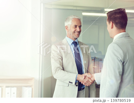 Handshake, senior businessman and praise for promotion, congratulations and thank you for recruitment. Business people, introduction and networking in office, collaboration and support in meeting Handshake, senior businessman and praise for promotion, congratulations and thank you for recruitment. Business people, introduction and networking in office, collaboration and support in meeting 139780519
