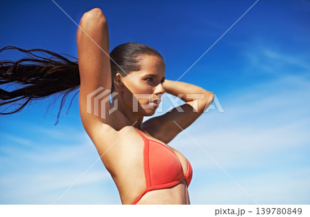 Beach, thinking and woman with vacation, summer and break with tropical island and getaway trip. Person, outdoor and sky background with girl and sunshine with fresh air and adventure with journey 139780849