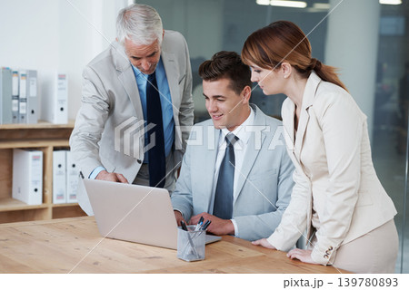 Laptop, meeting and business people in office for research on corporate legal project in collaboration. Team, technology and group of attorneys work on law case with computer in workplace boardroom. 139780893