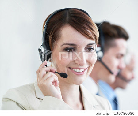 Woman, callcenter and phone call, CRM or contact us with headset and mic, coworking and smile for communication. Telecom, customer service or telemarketing with agent for tech support or help desk Woman, callcenter and phone call, CRM or contact us with headset and mic, coworking and smile for communication. Telecom, customer service or telemarketing with agent for tech support or help desk 139780980