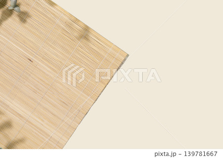 Background With Natural Bamboo Placemat On Neutral Backdrop Background With Natural Bamboo Placemat On Neutral Backdrop 139781667