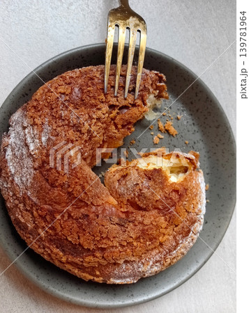 Deliciously flaky pastry sits on a plate waiting to be enjoyed Deliciously flaky pastry sits on a plate waiting to be enjoyed 139781964