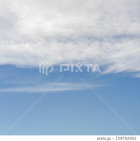 Sky background, lower part is clear blue, upper with cirrus clouds Sky background, lower part is clear blue, upper with cirrus clouds 139782002