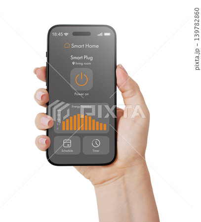 Female hand holding smartphone with smart home application interface showing energy monitoring statistics Female hand holding smartphone with smart home application interface showing energy monitoring statistics 139782860
