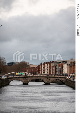 Dublin Ireland Cityscape Along River Liffey with Historic Bridges Waterfront Buildings 139783355