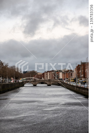Dublin Ireland Cityscape Along River Liffey with Historic Bridges Waterfront Buildings  139783356