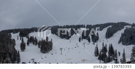 Vail Ski Resort Colorado Gondola Lift and Snow Covered Slopes with Skiers in Rocky Mountains Vail Ski Resort Colorado Gondola Lift and Snow Covered Slopes with Skiers in Rocky Mountains 139783393